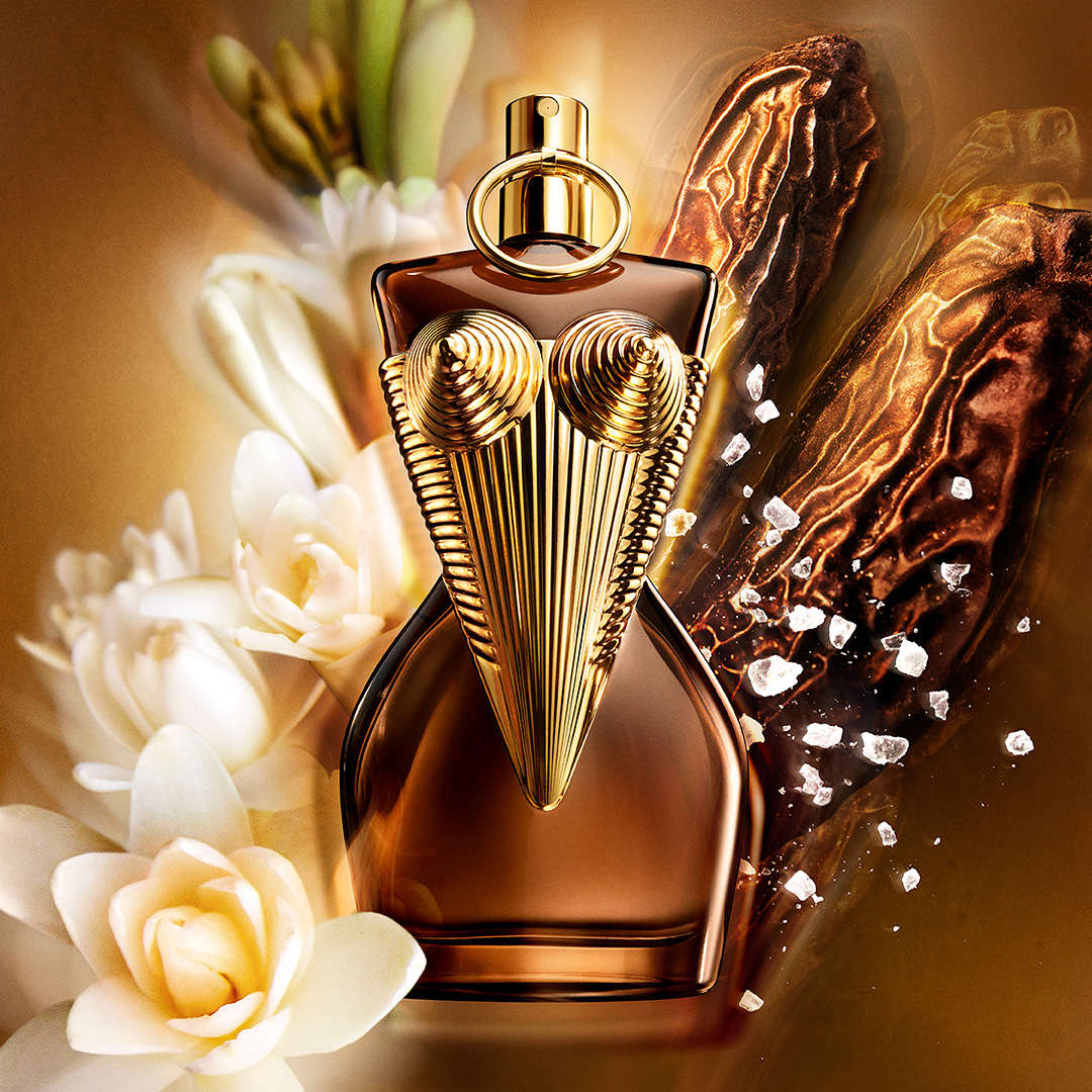 Gaultier Divine en Divine Elixir flacons op gouden achtergrond