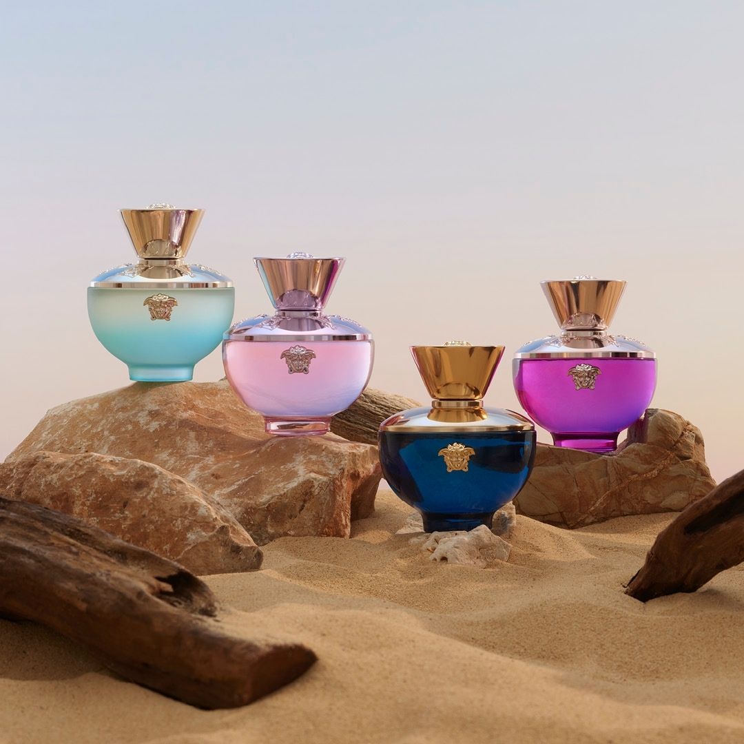 Versace Dylan Perfume line displayed on stones,