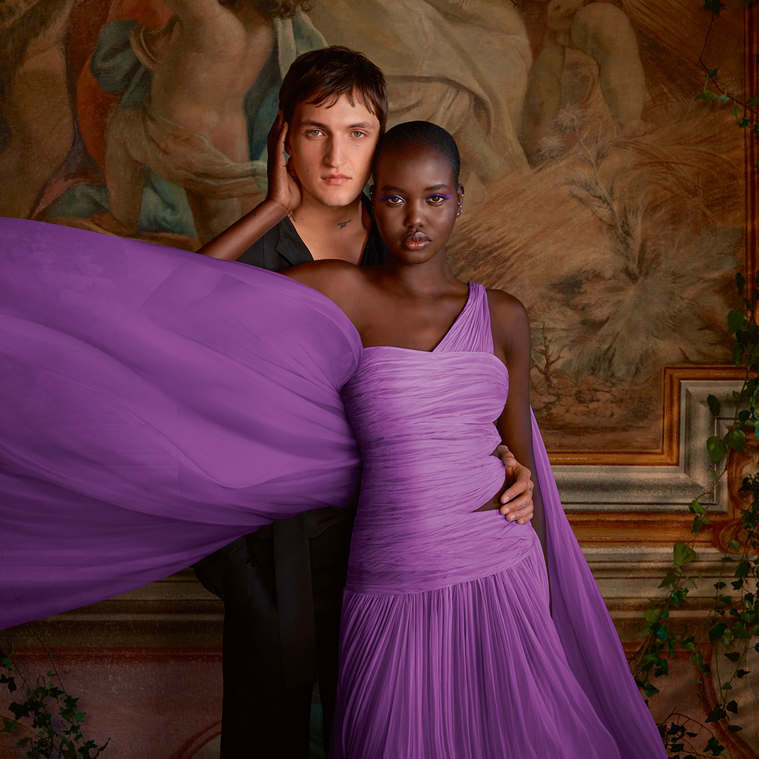 Female & male model in formal wear.